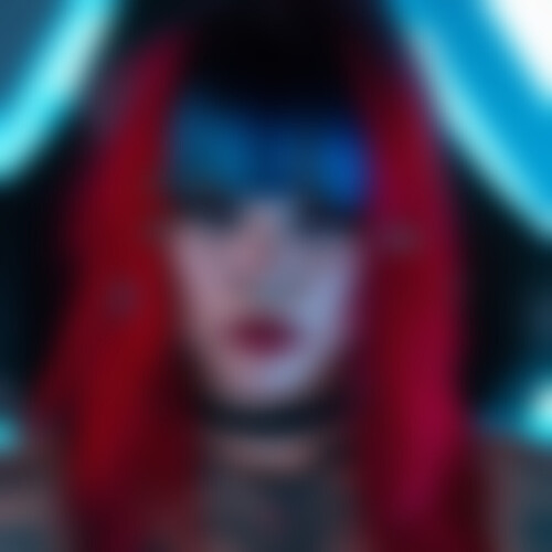 A punky young woman exhibiting red and blue ombre hair falling over pins and rings piercing both ears, concentrating through smokey teal lower and hot rod red upper lash accentuation on nailbiting survival horror adventures for her loyal band of subscribers, cradled in an angular leather and steel gamer throne